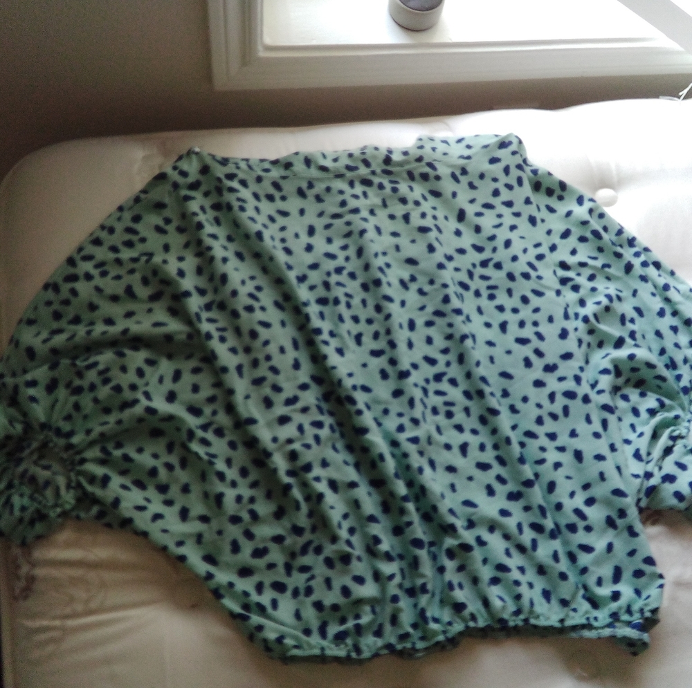 I am selling a patterned blouse top